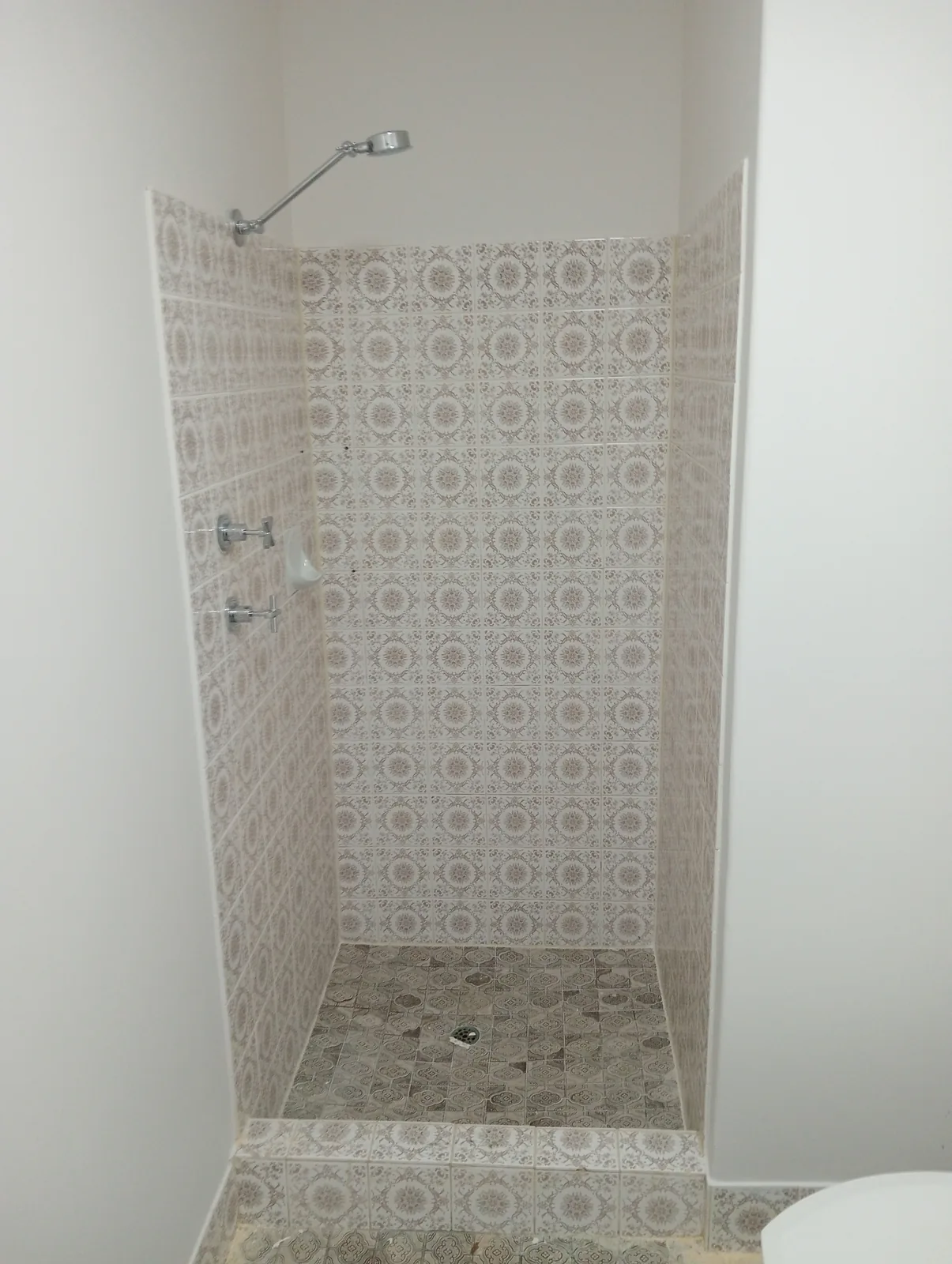 Tiled shower before screen installation